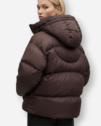 Gesteppte Damen Winterjacke mit großer Kapuze und verlängertem Saum hinten