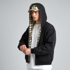 Oversized 2-in-1 Wende-Hoodie mit Karoseite