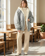 Oversized Winterjacke für Damen mit weicher Kapuze aus Kunstpelz im Bomber-Stil