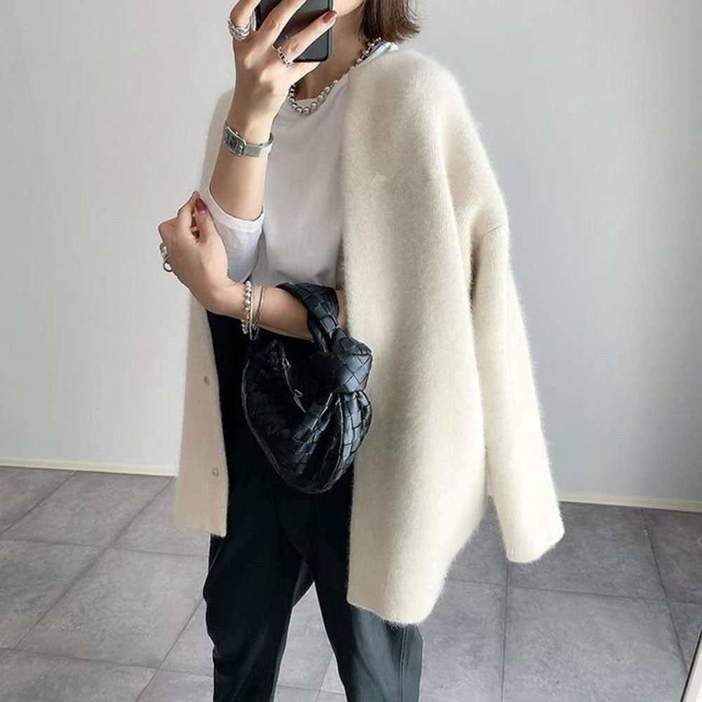 Elegante Strickjacke Damen | Zeitloses Design mit praktischen Taschen 1