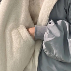 Oversized Winterjacke für Damen mit weicher Kapuze aus Kunstpelz im Bomber-Stil