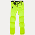 Damen-Wanderhose für Outdoor-Aktivitäten mit schwarzen Reißverschlüssen und Gürtel gelb