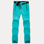 Damen-Wanderhose für Outdoor-Aktivitäten mit schwarzen Reißverschlüssen und Gürtel blau