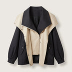 Wasserdichte Regenjacke mit Kapuze und Taillenzug in Schwarz
