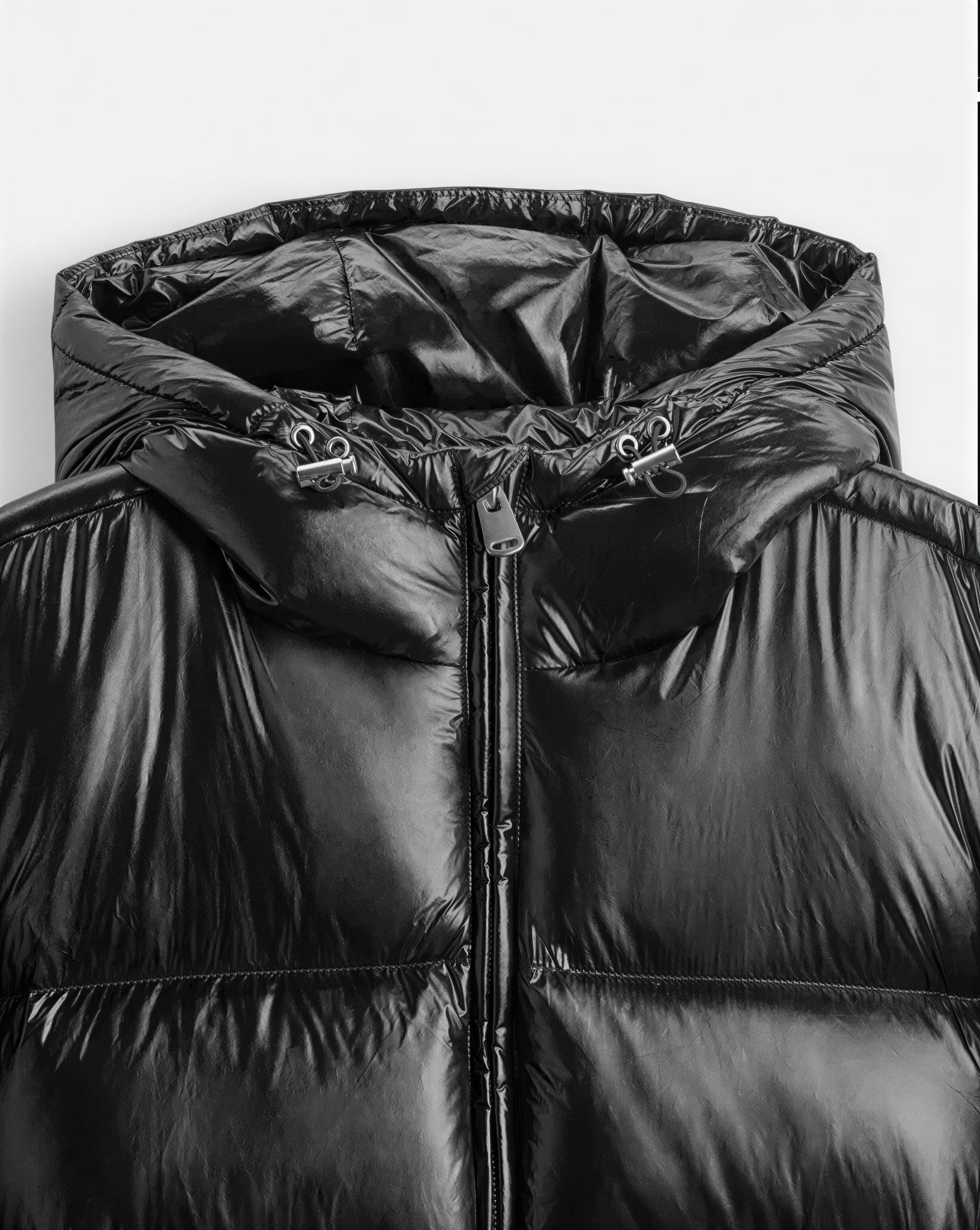 Unisex Pufferjacke in mittellanger Passform mit integrierter Kapuze