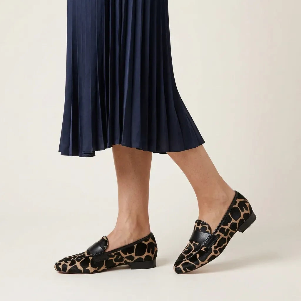 Loafer für Damen mit flachem Absatz aus strukturiertem Fell mit Animal-Print Schwarz 1