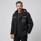 Softshelljacke für Herren in winddichter Qualität mit Kapuze für die Übergangszeit Schwarz 13